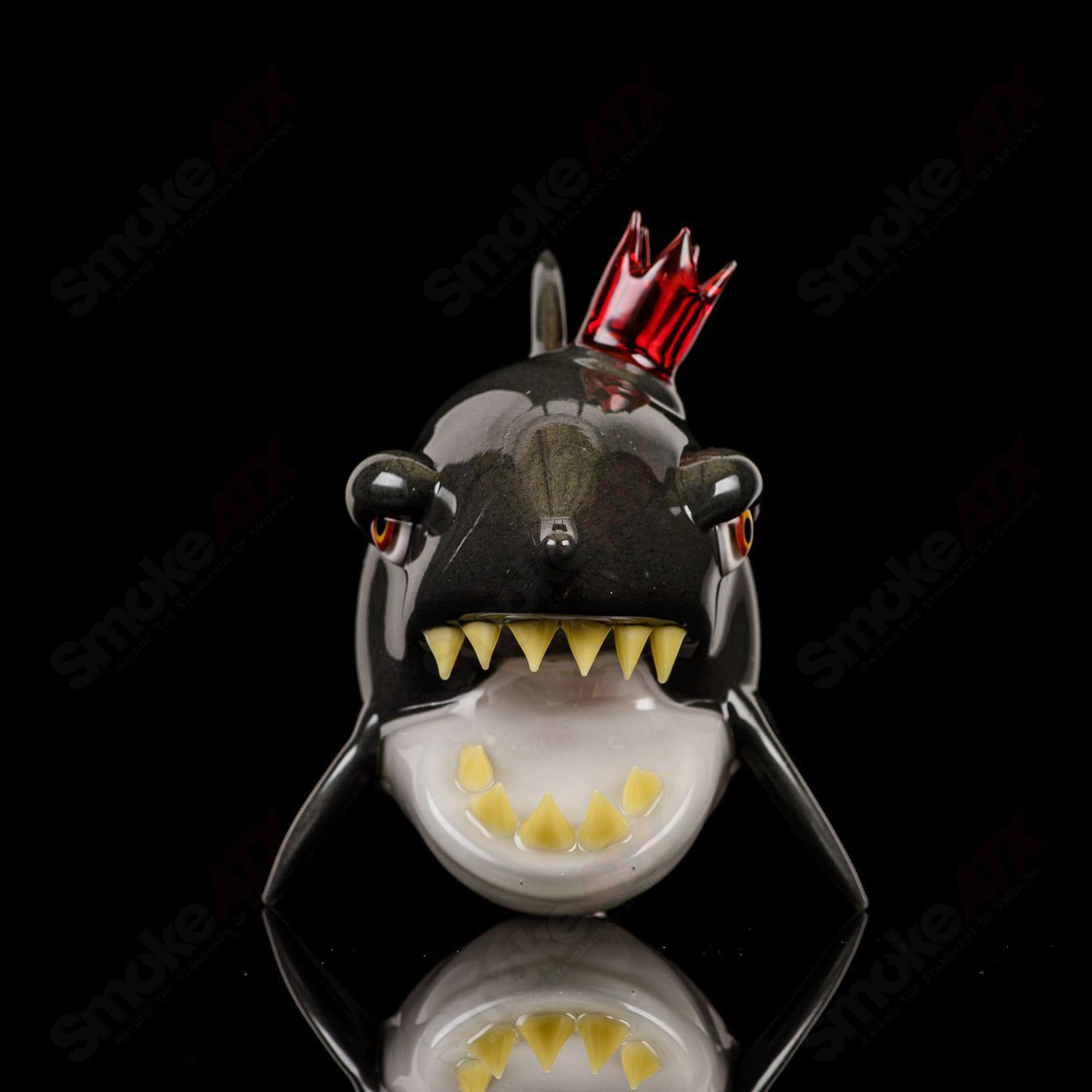 Heady glass concentrate rig featuring a Crown Bones Shark design by Niko Cray with vibrant, artistic glasswork.