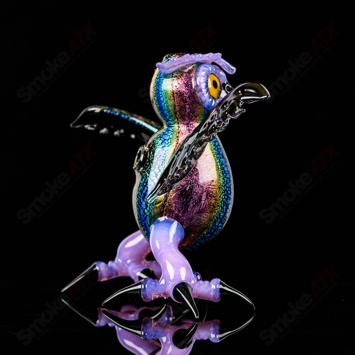 Dichro EDM owl concentrate rig by Turtle Time Glass, colorful heady glass art piece with intricate design and glasswork details.