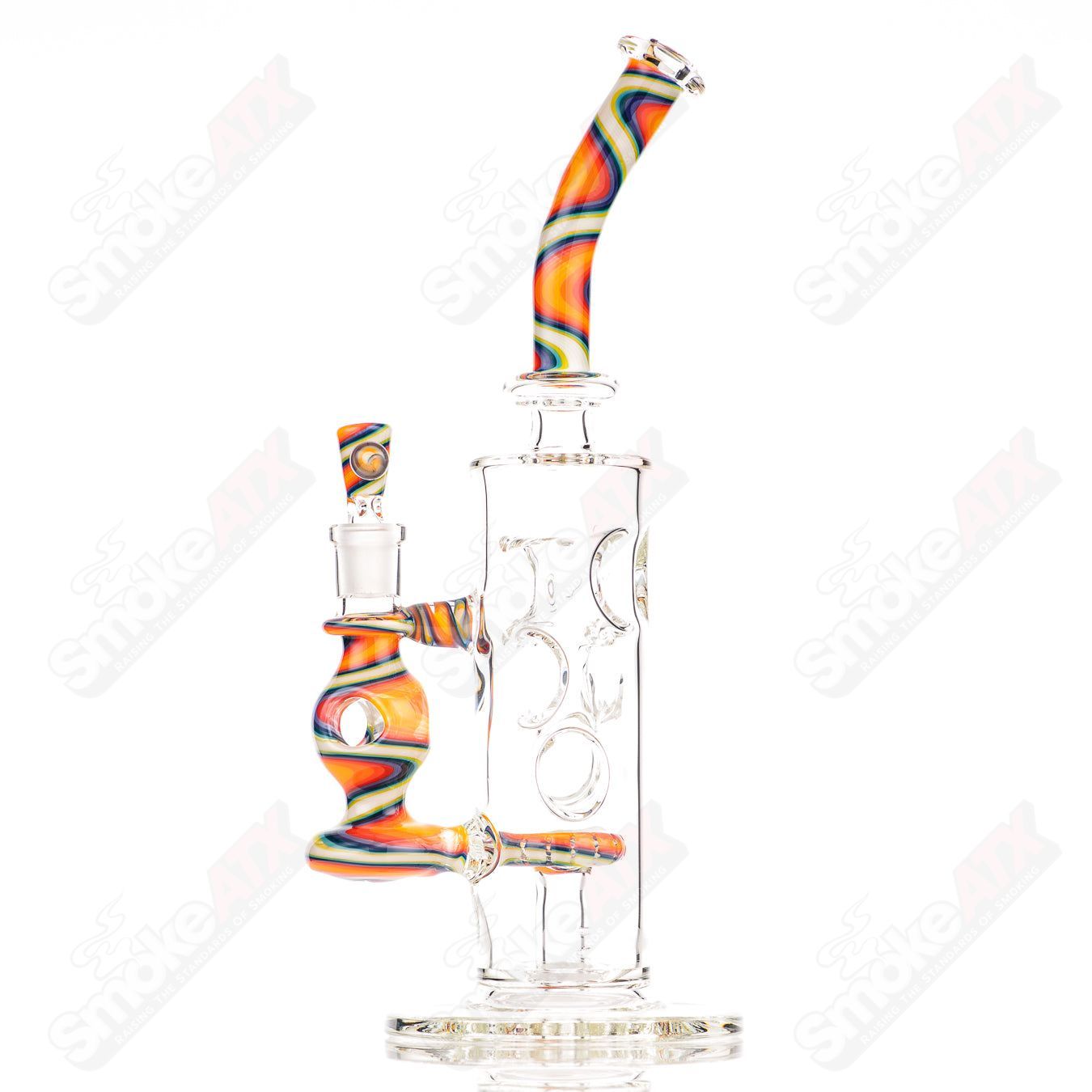 Glass donut ball rig by Texas Hot Glass featuring a colorful donut-shaped design with intricate glass details.