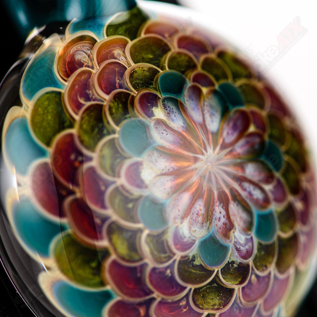 Juju Glass Dotstack Pendant in colorful glass with layered dot design, hangs on a silver chain, showcasing vibrant craftsmanship.