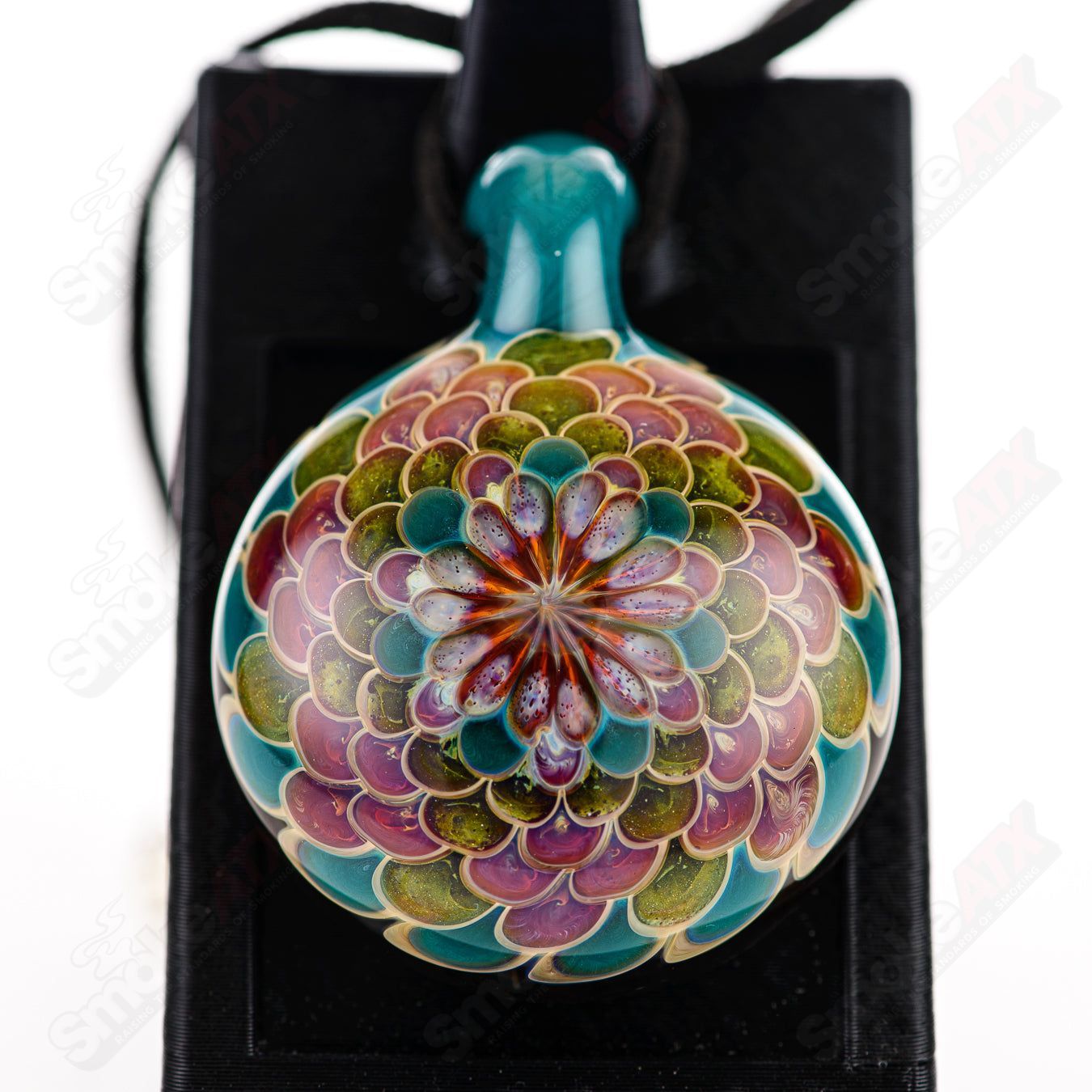Juju Glass Dotstack Pendant in colorful glass with layered dot design, hanging on a silver chain.