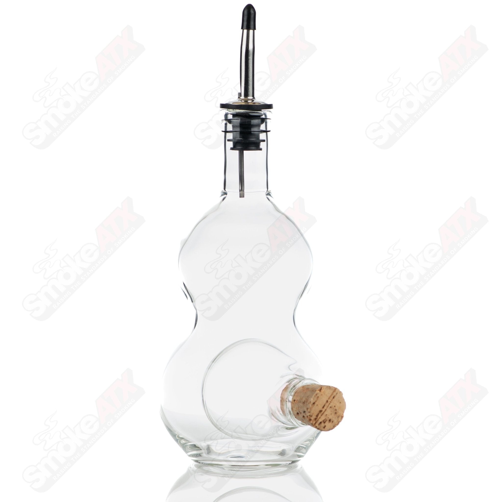 Double chamber liquor bottle and stash jar by Texas Hot Glass, featuring clear glass and intricate heady glass design.