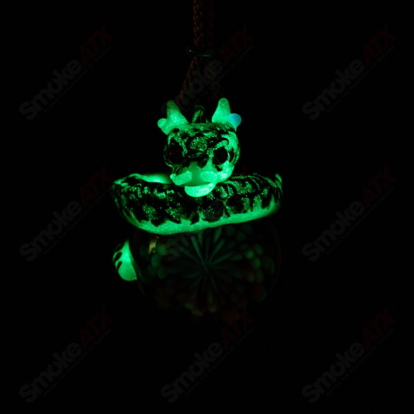 Colorful Dragon Flower Pendant by Kengtaro, made of intricate glass with detailed floral design, designed as a heady glass pendant.