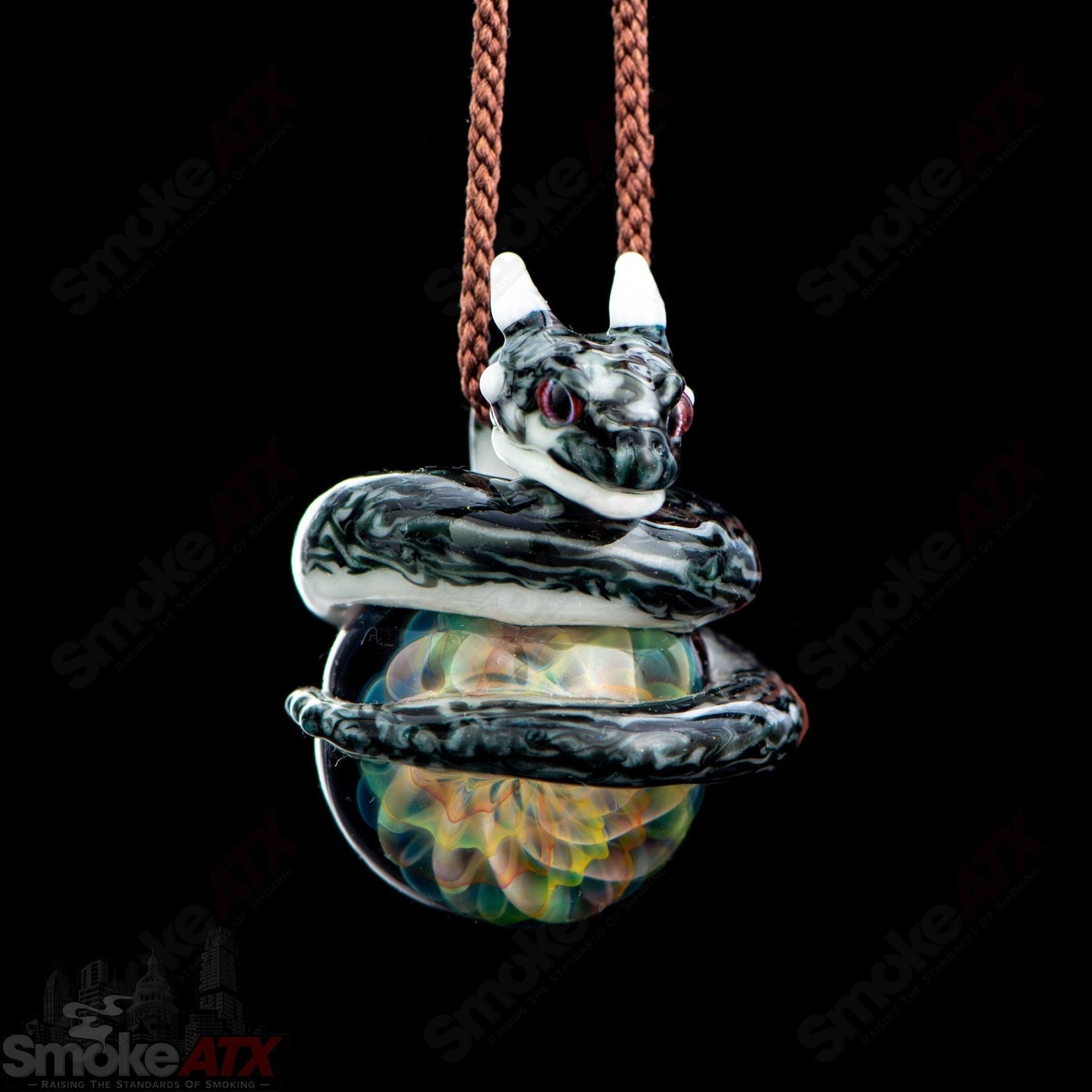 Kengtaro Dragon Wind Pendant made of colorful glass with intricate dragon design, perfect for heady glass jewelry enthusiasts.