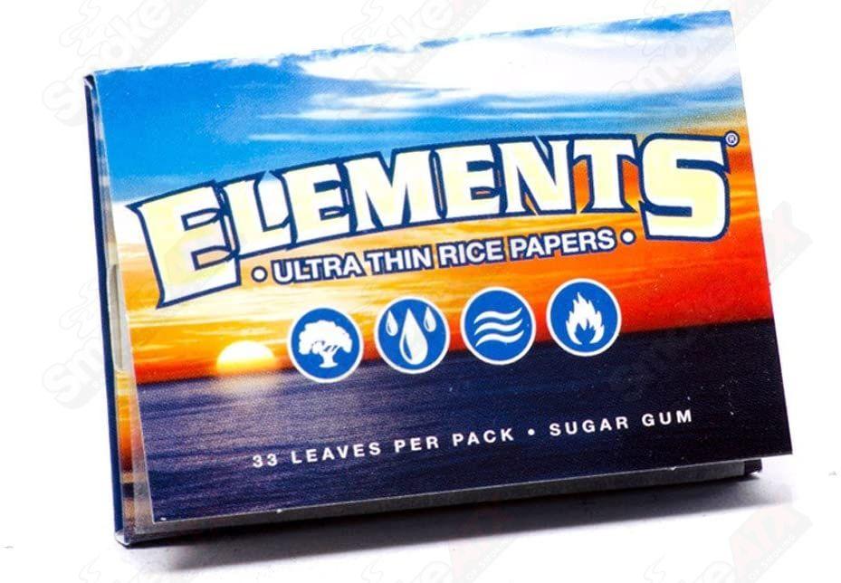 Elements Rice 1 1/2 rolling paper pack showing thin, natural rice paper with branded packaging for rolling cigarettes or herbs.
