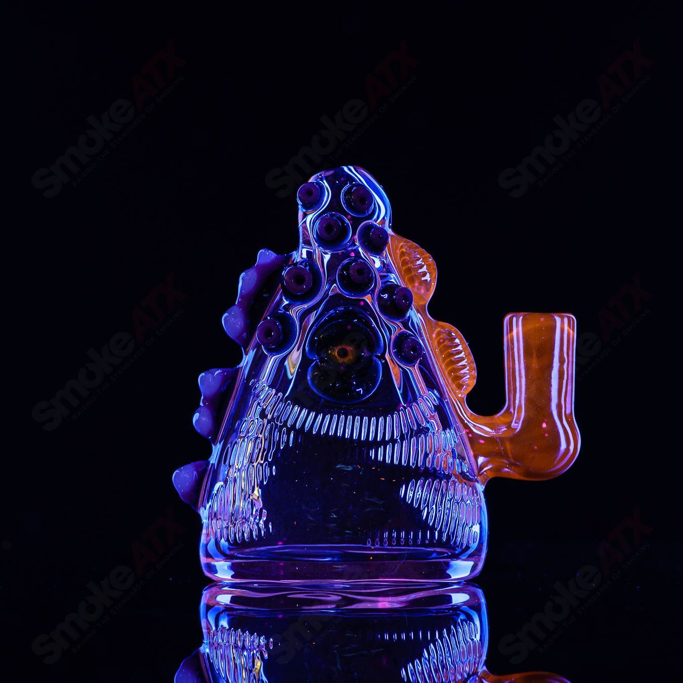 Salt Glass Eyepod #113 concentrate rig with Neutronium and Gunmount black design, showcasing intricate glasswork and compact size.