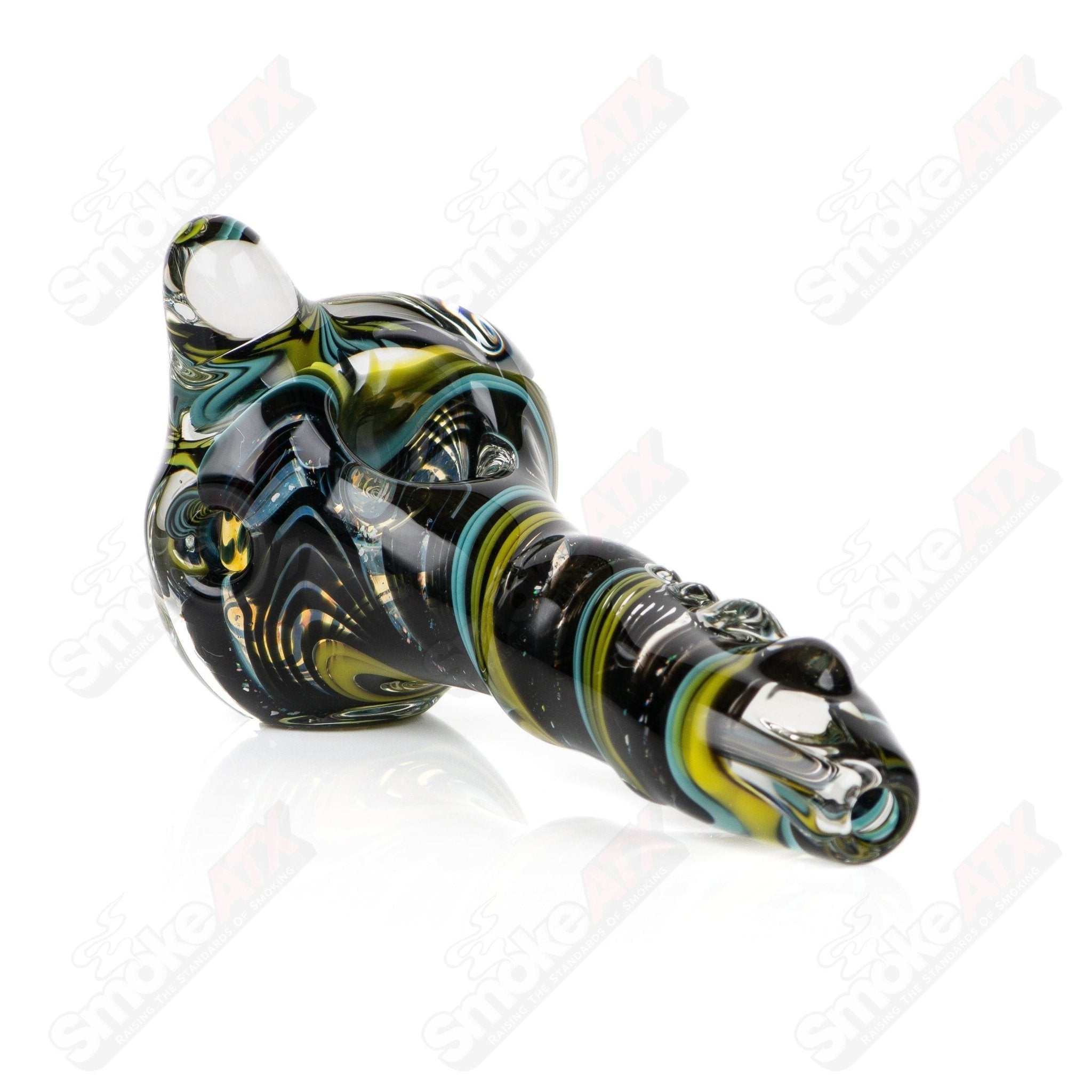 Glass Filla Twist Spoon Pipe by Rotational Science with a clear, curved design for smooth smoking experiences.