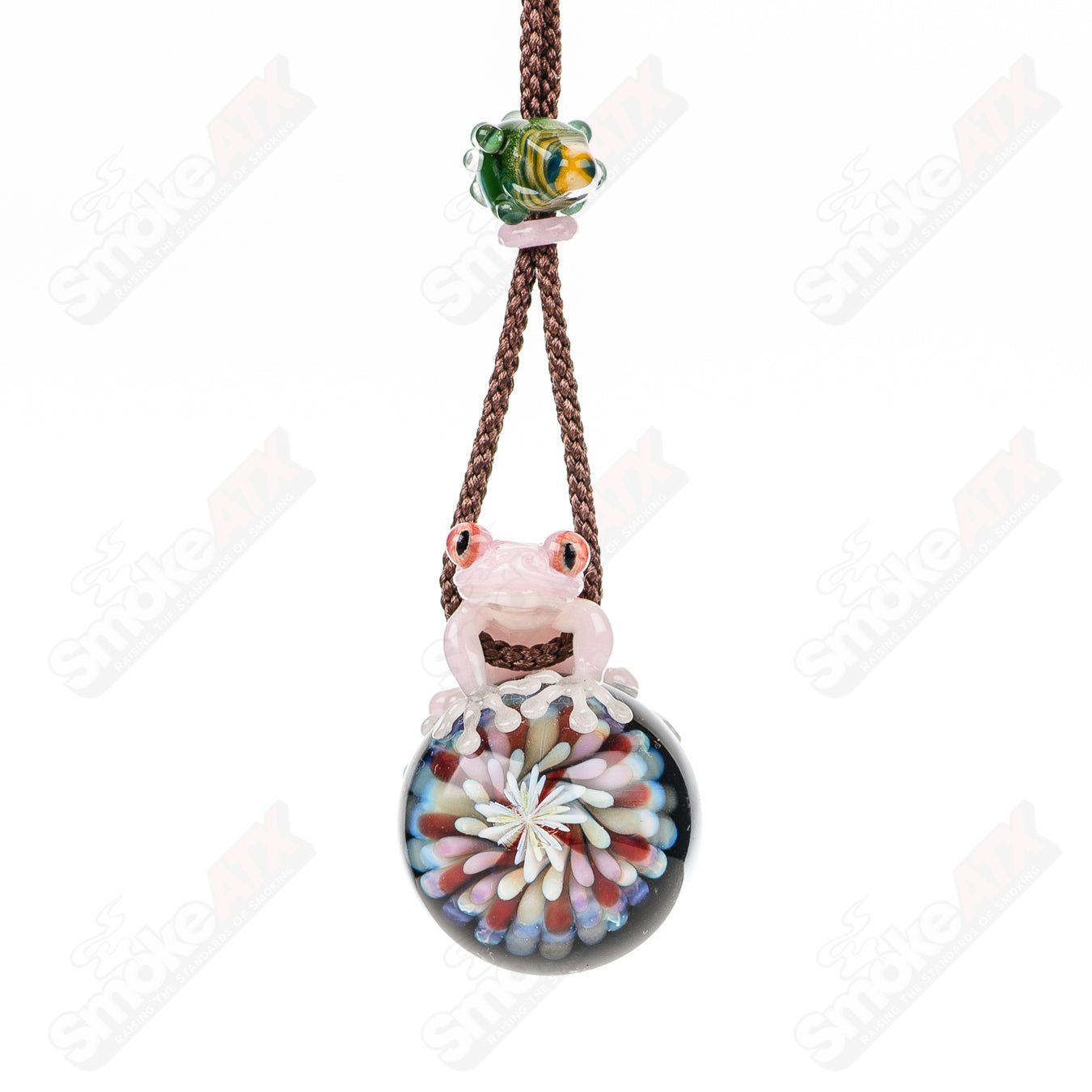 Kengtaro Flower Pendant made of colorful glass, featuring intricate floral design, heady glass jewelry piece.