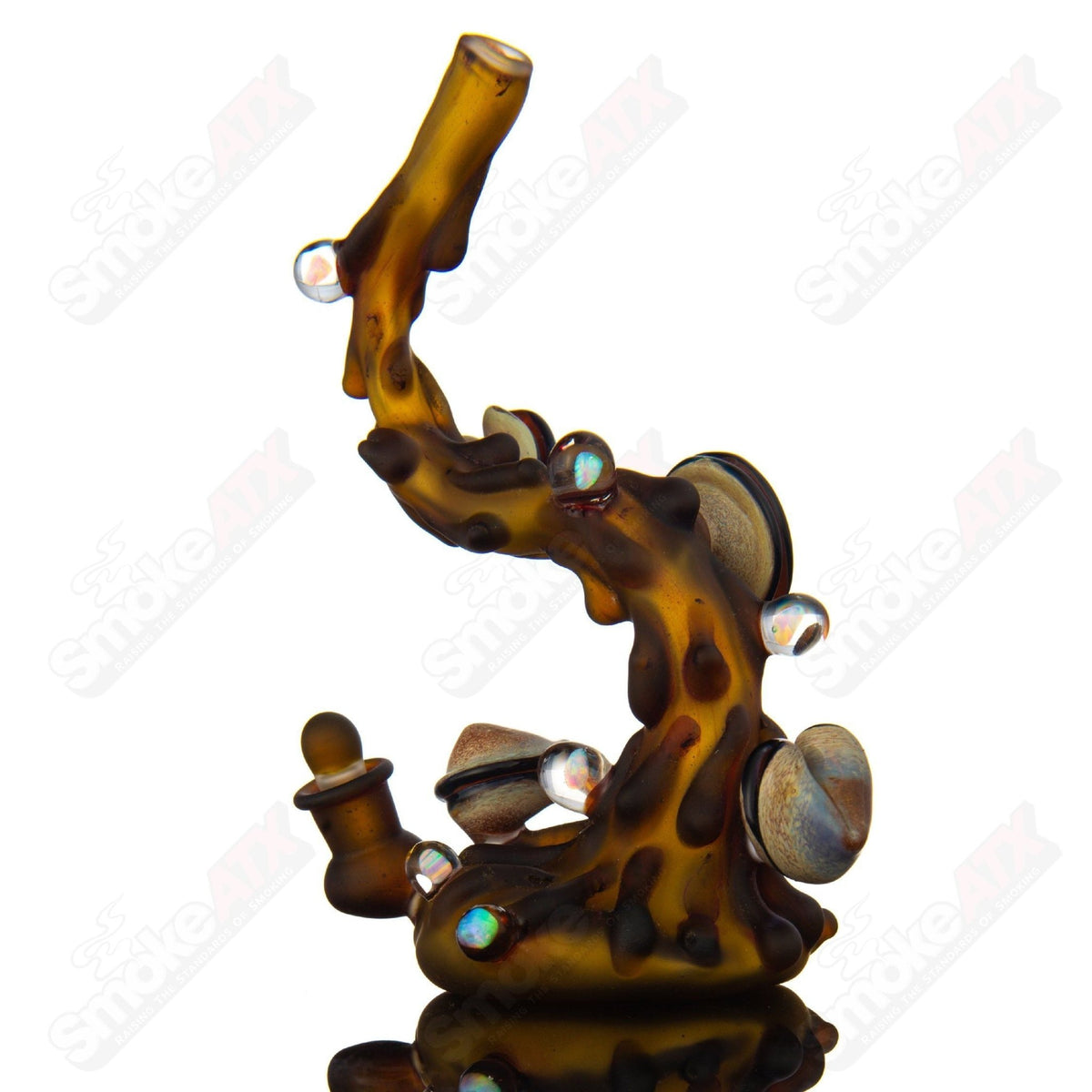Dux Glass flowing tea rig with a teacup-shaped head, clear heady glass design for concentrates, detailed craftsmanship.
