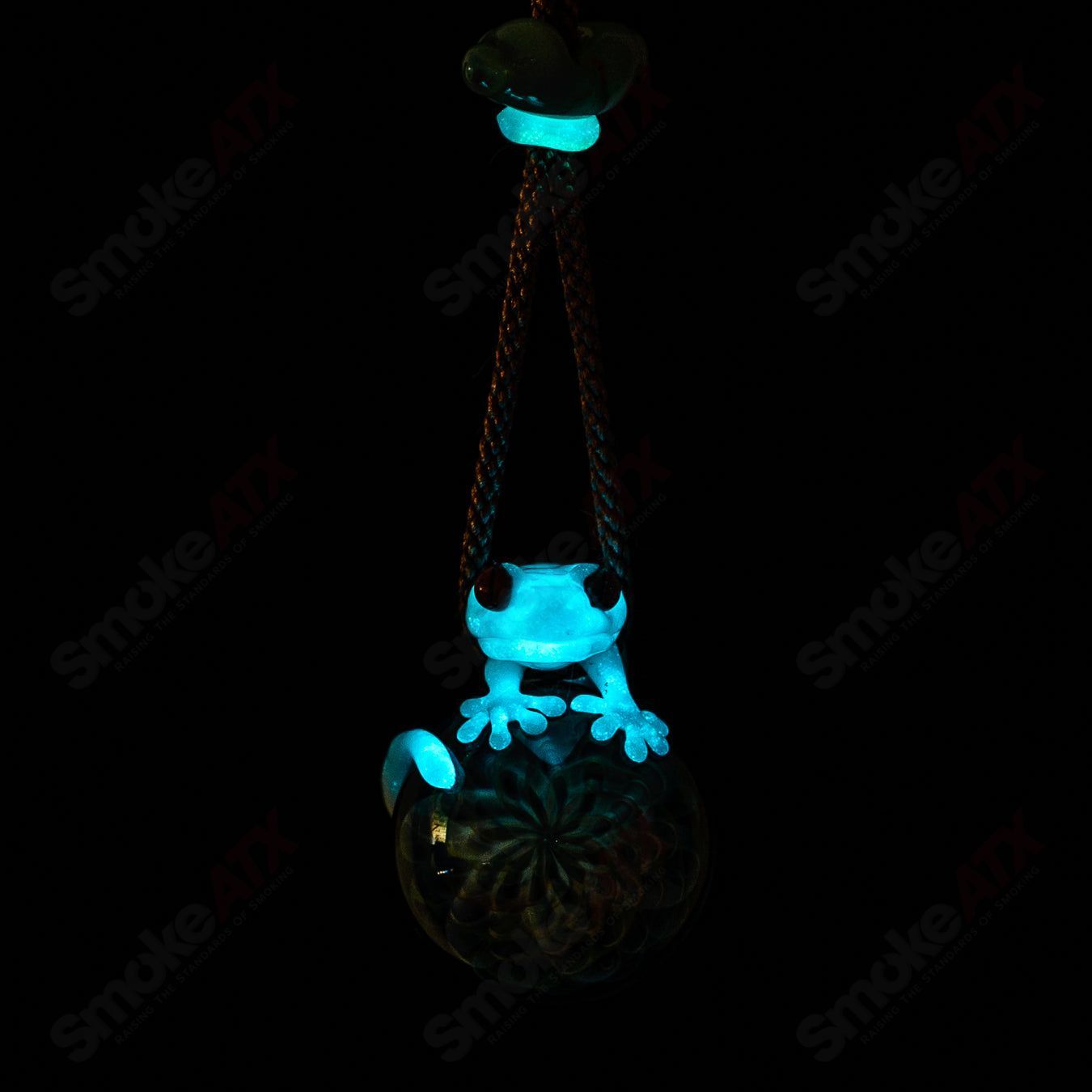 Colorful Kengtaro glass pendant featuring a gecko and flower design, crafted in vibrant, artistic heady glass style.