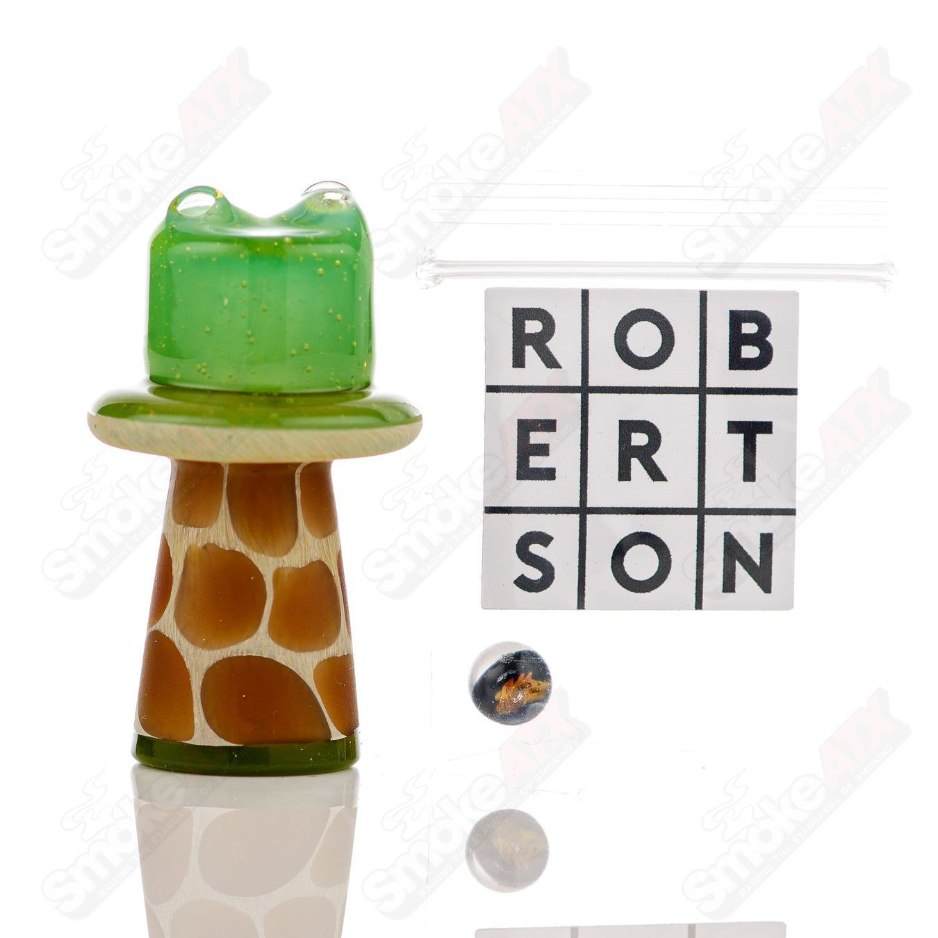 Green giraffe-shaped spinner cap with pearl accents for Robertson Glass heady glass carb cap, detailed glass craftsmanship.