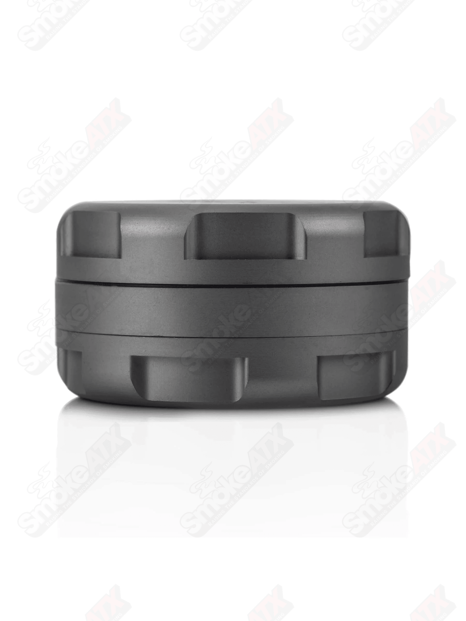 Gun Metal Grav 3-piece 1.25-inch metal grinder with textured surface and removable sections for grinding and storage.