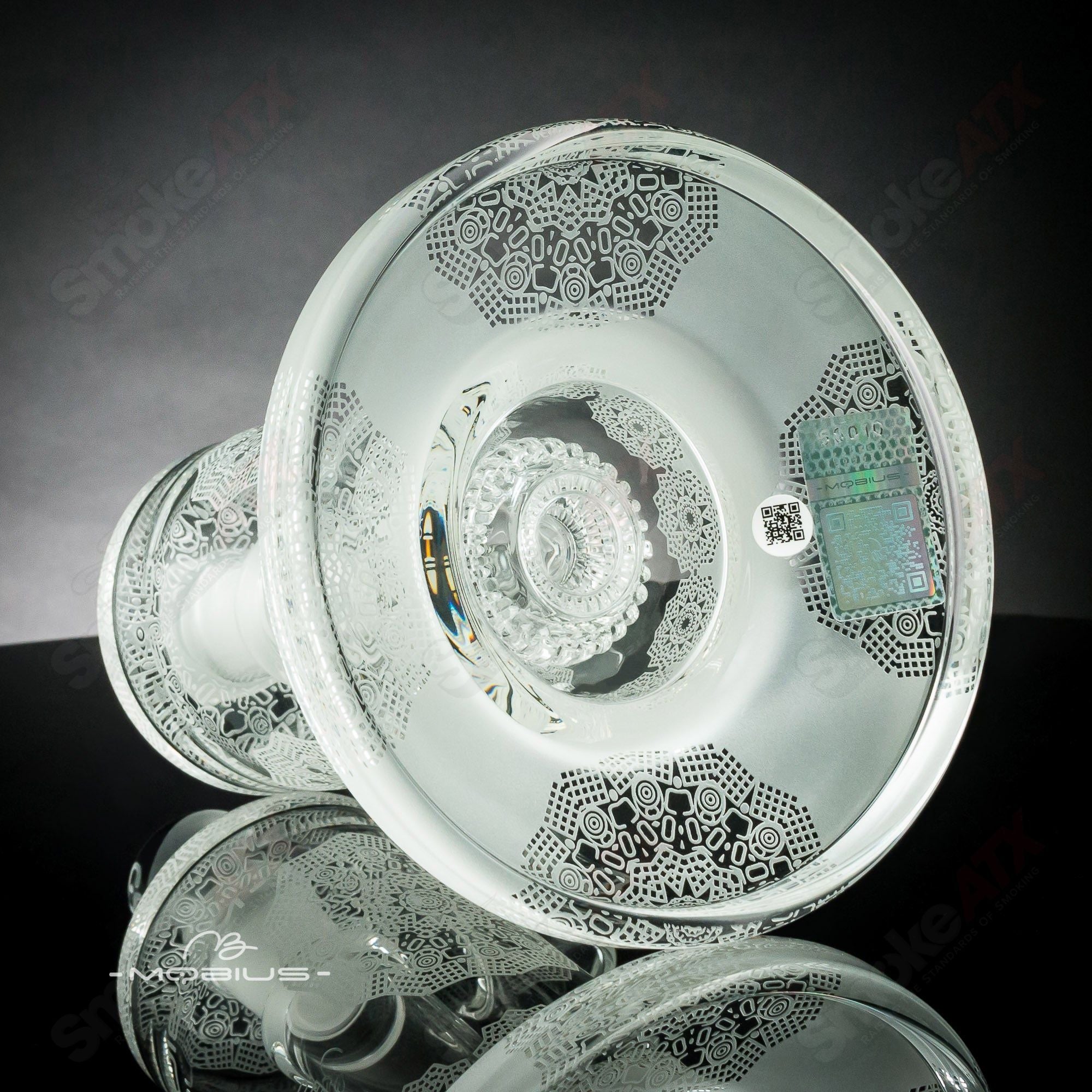 Mobius Ion Matrix V1 Coldwork Series #5 glass waterpipe with intricate design and clear glass construction.