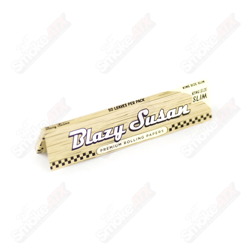 King size slim unbleached Blazy Susan rolling papers for smooth rolling, featuring natural unbleached paper in a pack.