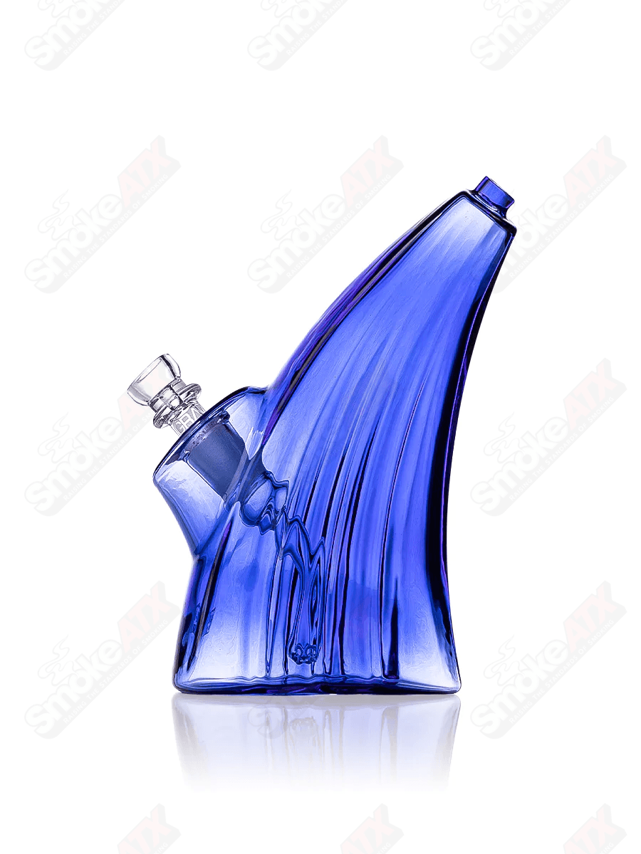 Light cobalt wave bubbler water pipe by Grav, featuring a smooth glass design with a wave pattern for enhanced airflow and style.