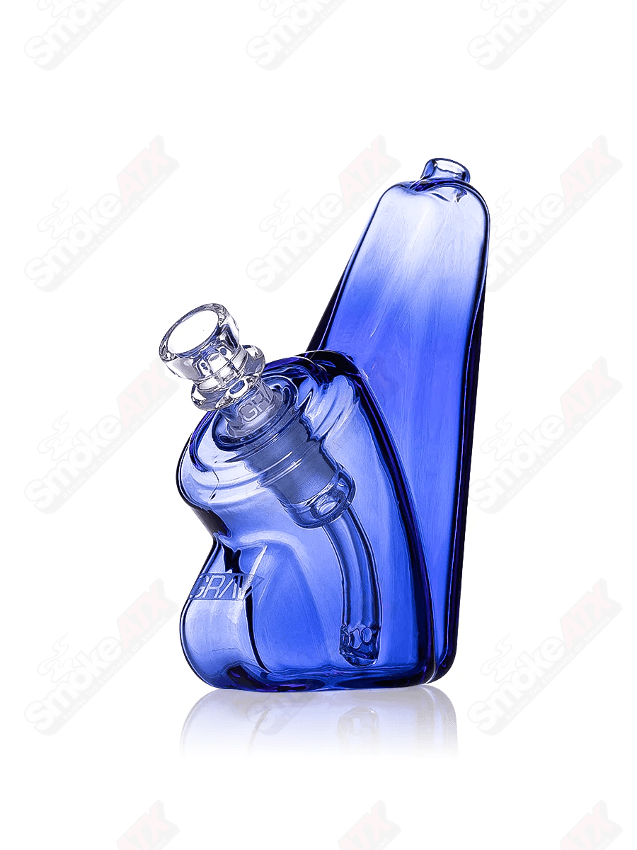 Light cobalt wedge-shaped glass bubbler waterpipe by Grav Labs with a sleek, compact design for smooth smoking experiences.