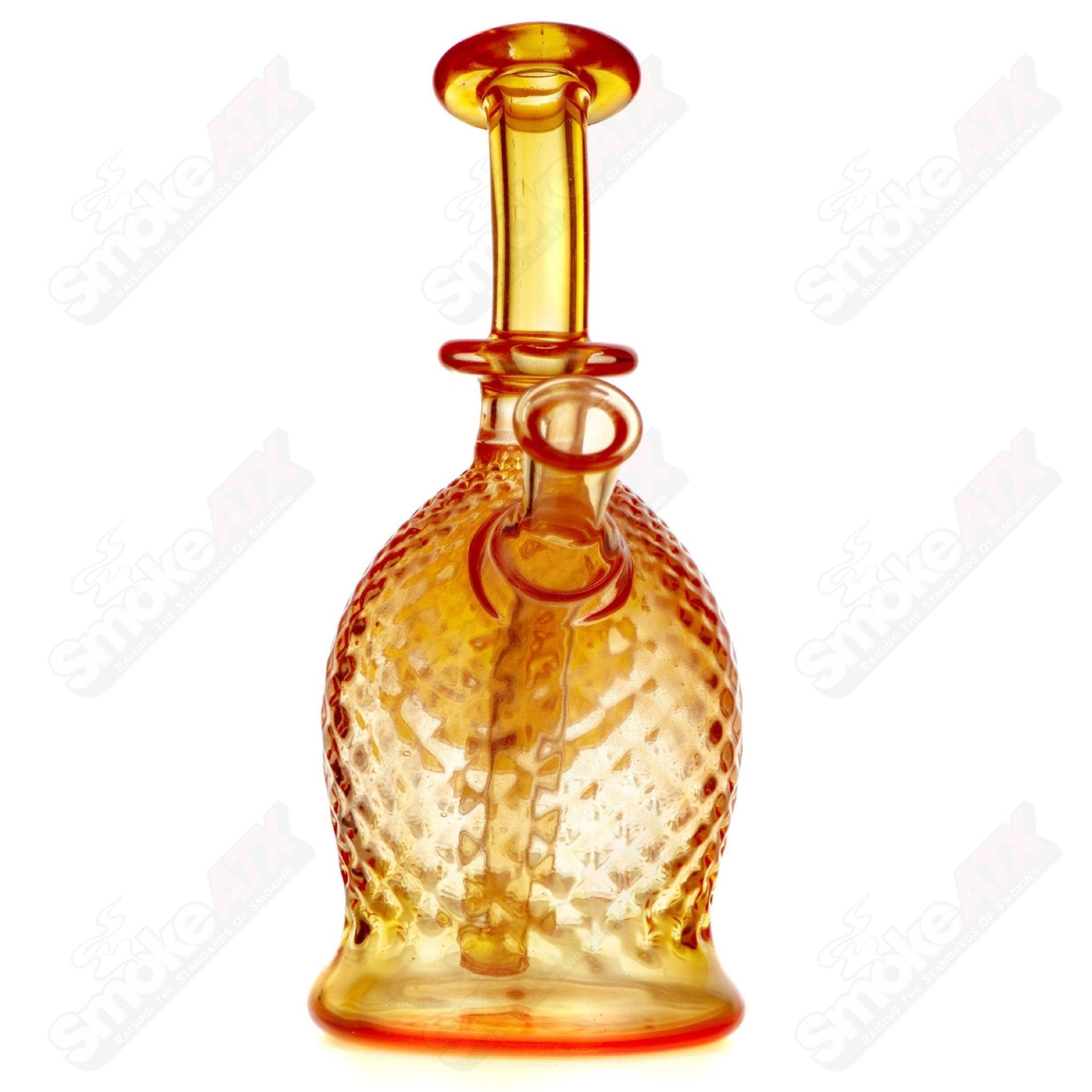 James Lang Magma Diamond Tech Rig, a glass concentrate rig with intricate diamond patterns and a clear, durable design.