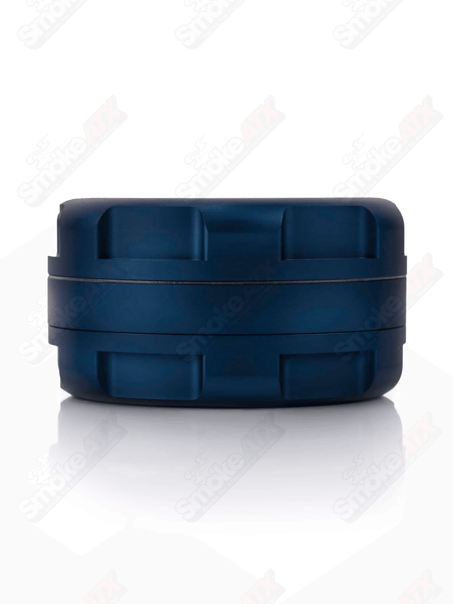 Midnight blue 3-piece 1.25-inch metal grinder by Grav, featuring textured grip and sharp teeth for grinding herbs.