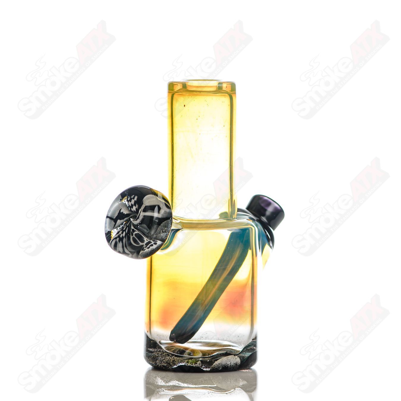 Mini Rig #2 by Cap’n Crunk, a heady glass concentrate rig with intricate designs and clear glass construction.