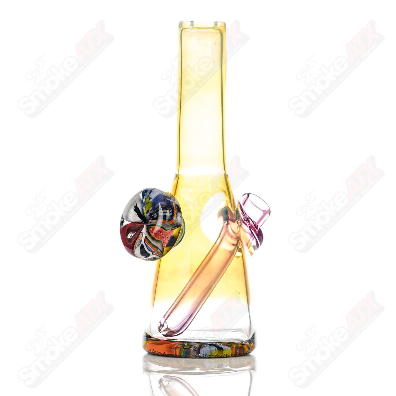 Mini Rig #6 by Cap’n Crunk, a heady glass concentrate rig with intricate design and clear glass construction.