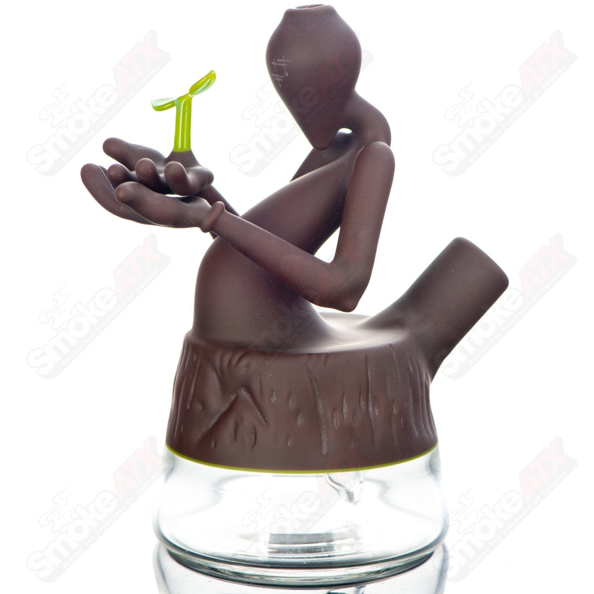 Yunk Glass Nurturing Nature Rig, a heady glass concentrate rig with detailed design and colorful accents for dabbing.