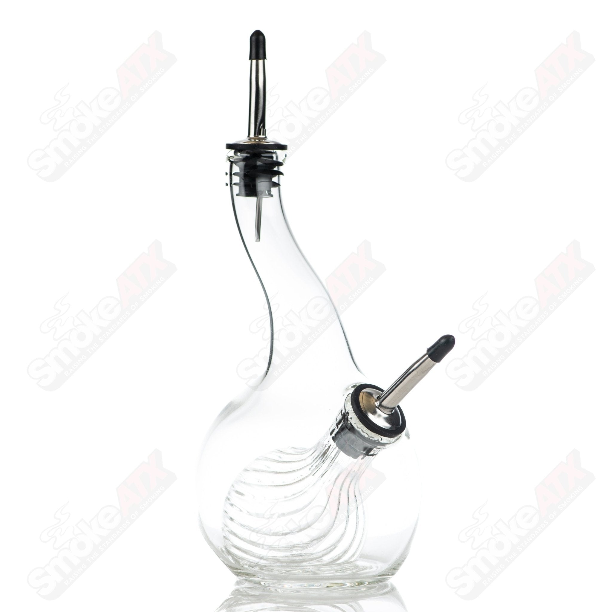 Ribbed glass pour bottle for oil and vinegar by Texas Hot Glass, featuring a clear, textured design for kitchen use.