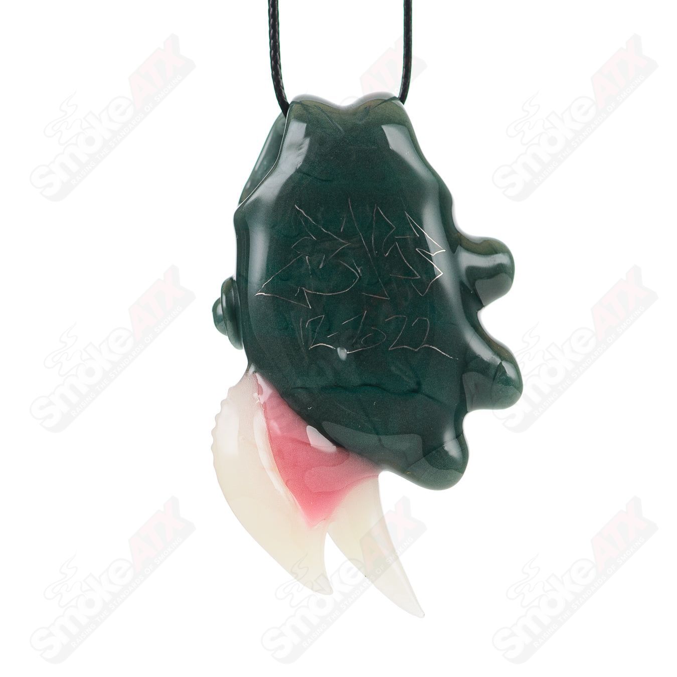 Black Gunmount pendant from Salt Glass, a heady glass pendant with intricate design on a sleek black background.