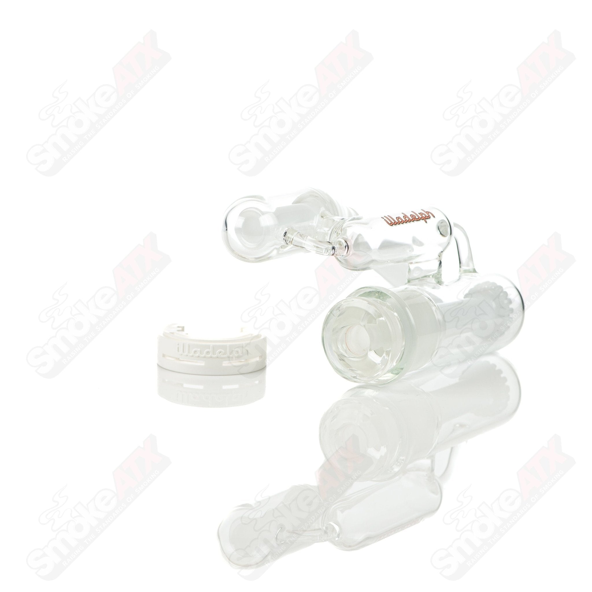 Pink disc glass ash catcher for waterpipe by Illadelph, featuring a stylish design and durable construction.