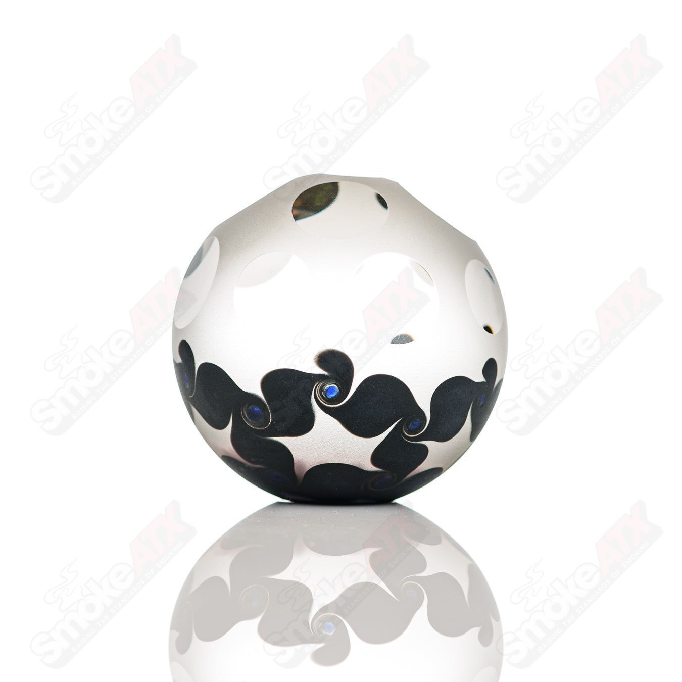 Pink faceted marble Raj K glass from Raj Kommineni Glass, featuring intricate glasswork and vibrant pink color.
