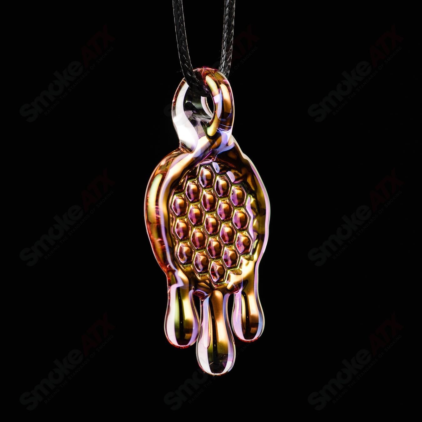 James Lang pressed honeycomb glass pendant necklace featuring a textured honeycomb design with warm amber tones.