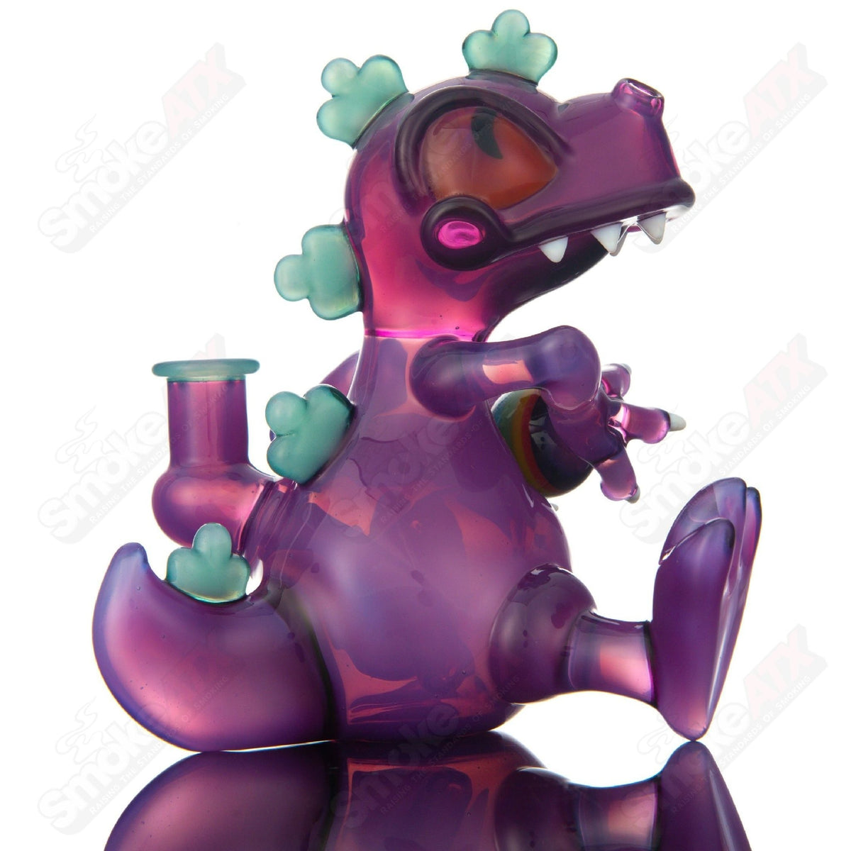 Purple Reptar sitting rig with encalmo egg, J-Smart Glass heady concentrate rig featuring vibrant purple glass and intricate details.