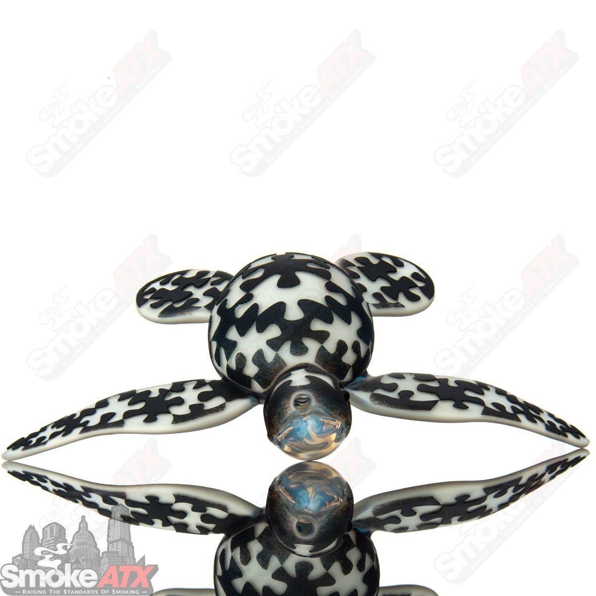 Addison Hanna Puzzle Turtle Collab Rig, a colorful glass concentrate rig featuring intricate turtle and puzzle designs.
