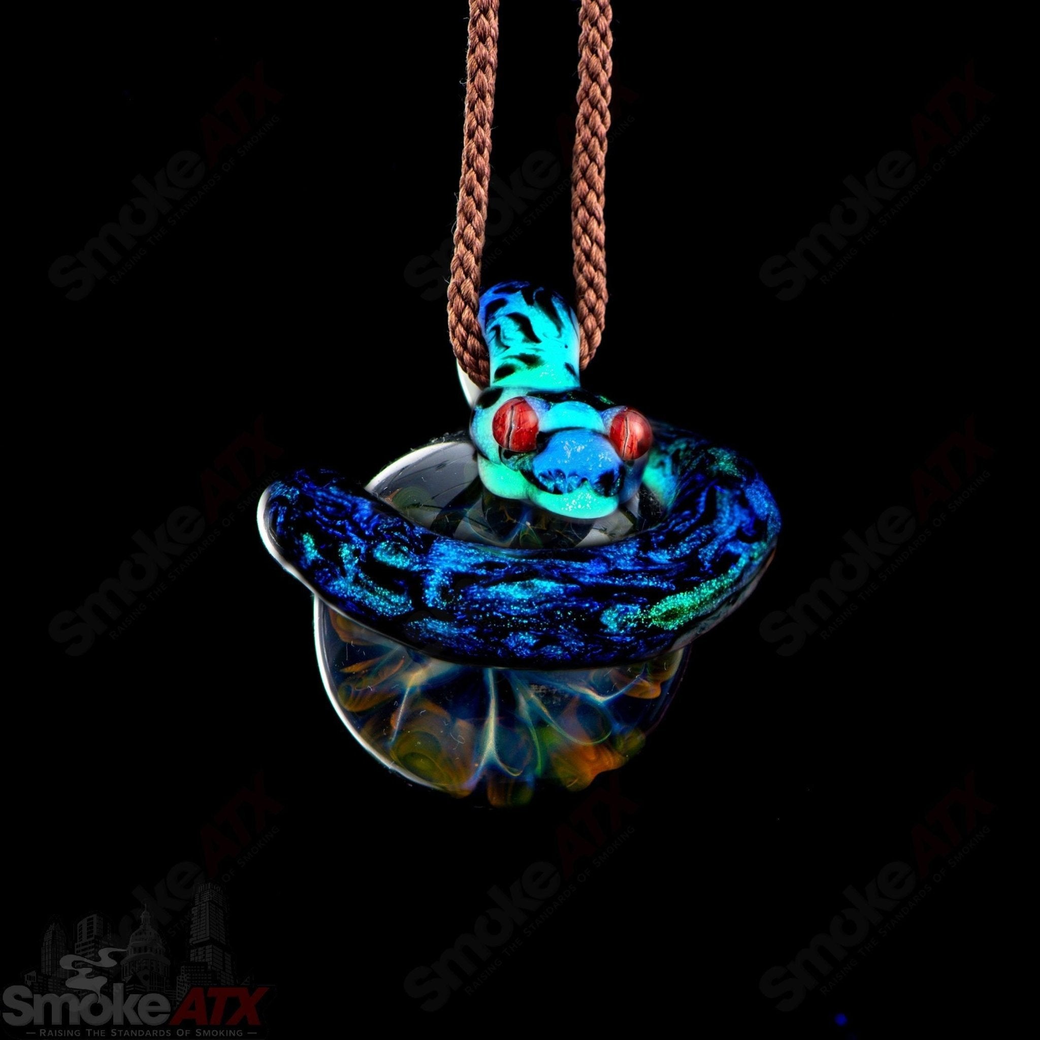 Kengtaro Python Pendant made of colorful glass, featuring a detailed, coiled python design, heady glass pendant jewelry.