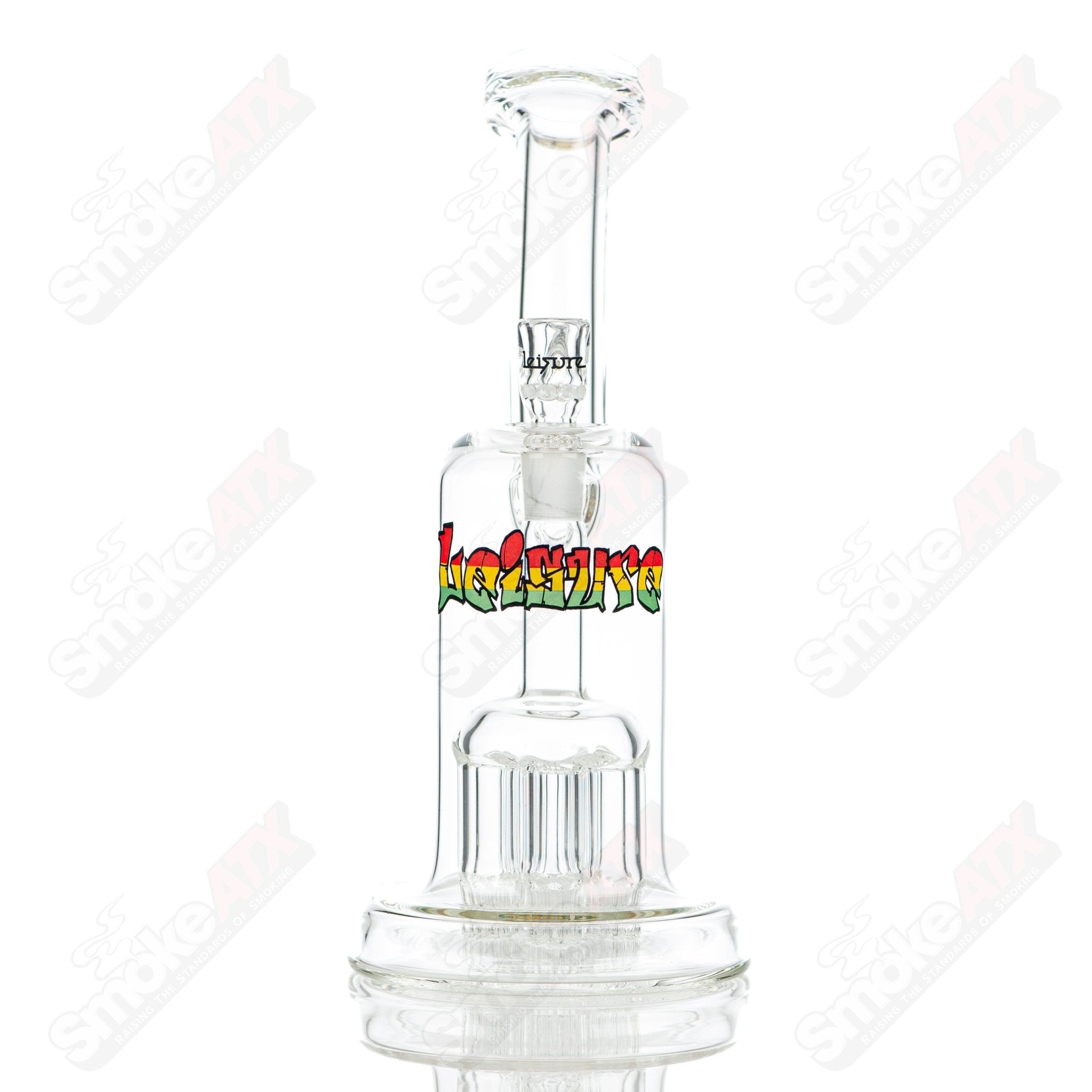 Leisure Glass Rasta 44 Mag concentrate rig with colorful Rasta design and clear glass body for dabbing and concentrates.