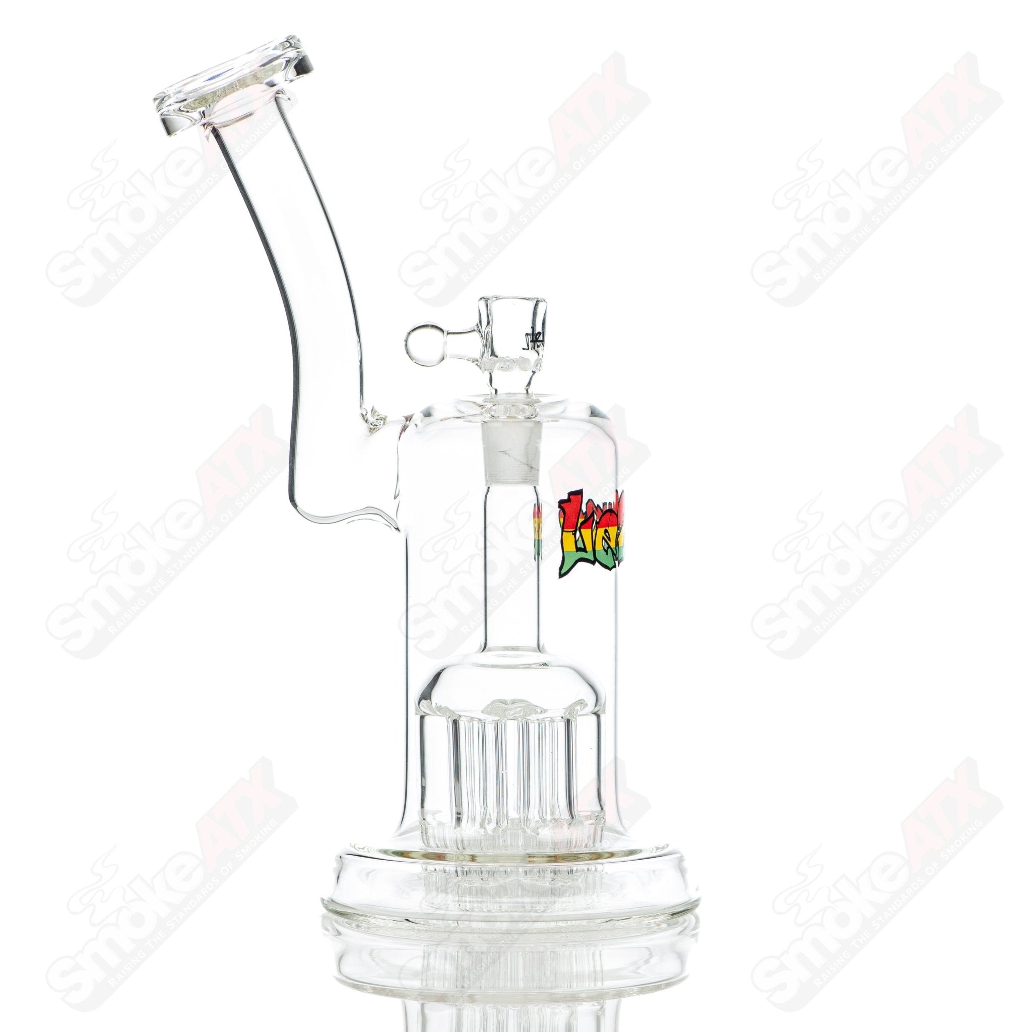 Leisure Glass Rasta 44 Mag Leisure concentrate rig with colorful Rasta design and glass construction for dabbing or vaporizing.