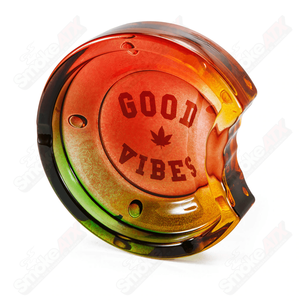 Rasta C Bite Cookies ashtray by Cookies, featuring colorful Rasta design and a sturdy ceramic surface for 420 smoking accessories.