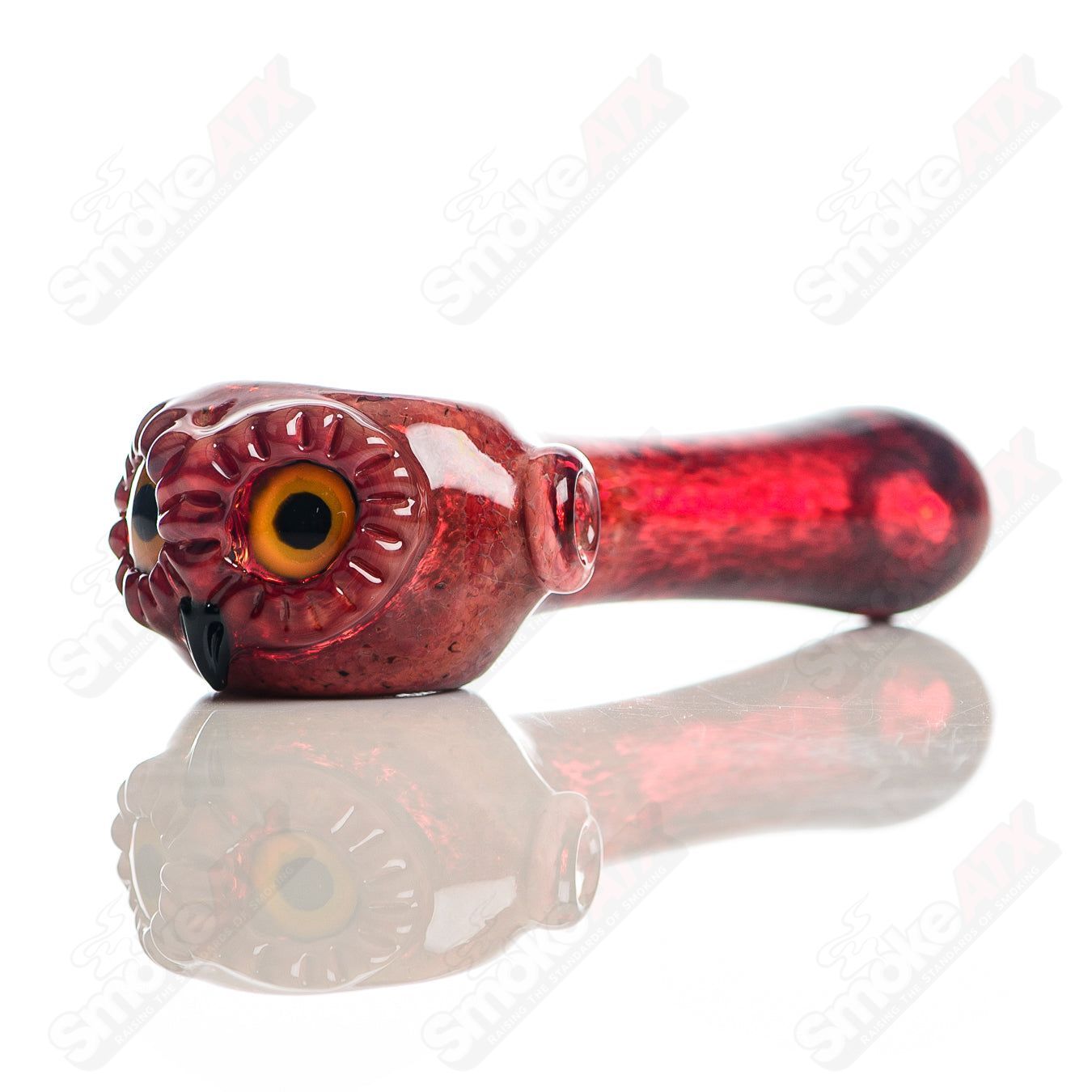 Red spotted owl glass spoon pipe by Four Winds Flameworks, featuring detailed owl design and vibrant red spots.