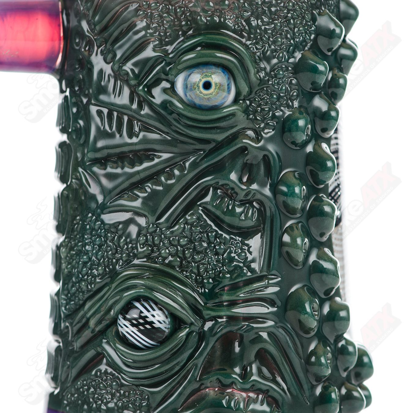 Reticello Many Face Drinking Mug by Salt Glass, handcrafted heady glass cup with intricate design and multiple facial expressions.