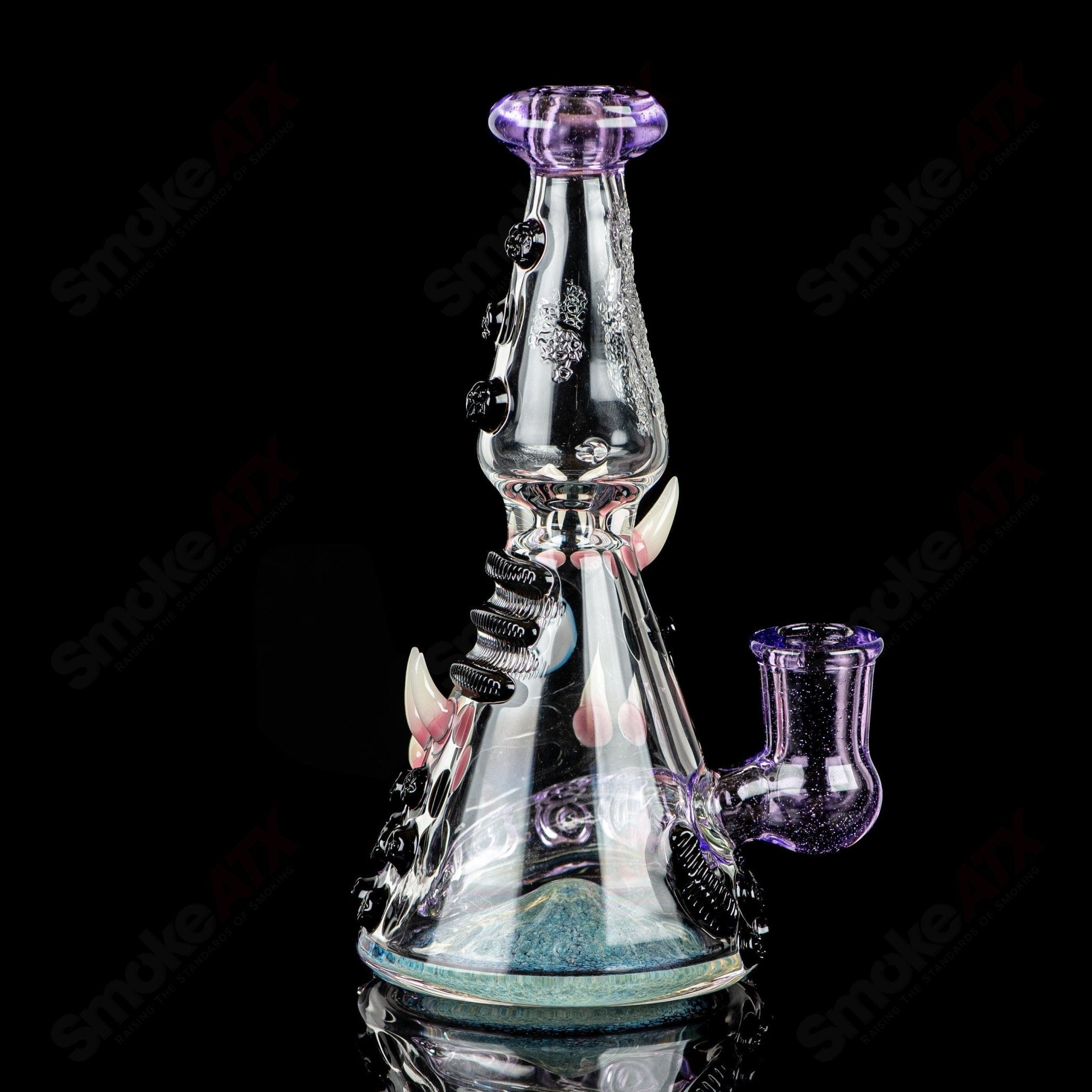 RipCurl by Helix & Salt Glass Heady Glass concentrate rig with intricate glasswork and vibrant design, ideal for concentrate vaporization.