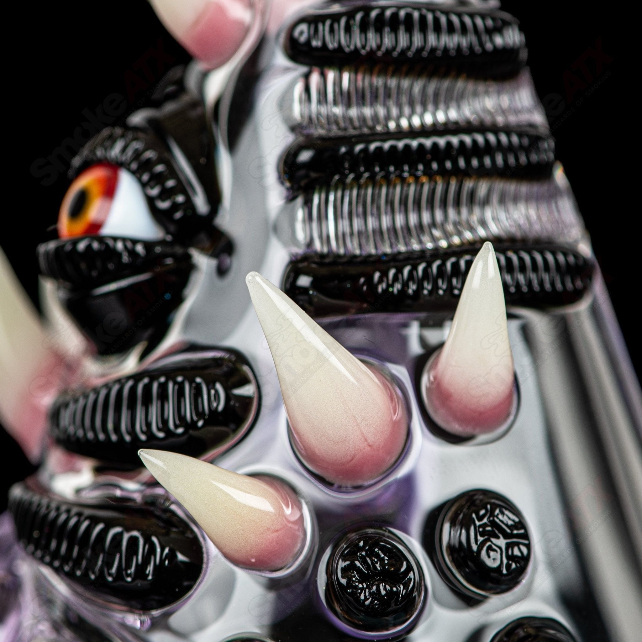 RipCurl by Helix & Salt Glass Heady Concentrate Rig featuring intricate glasswork and a vibrant, artistic design.