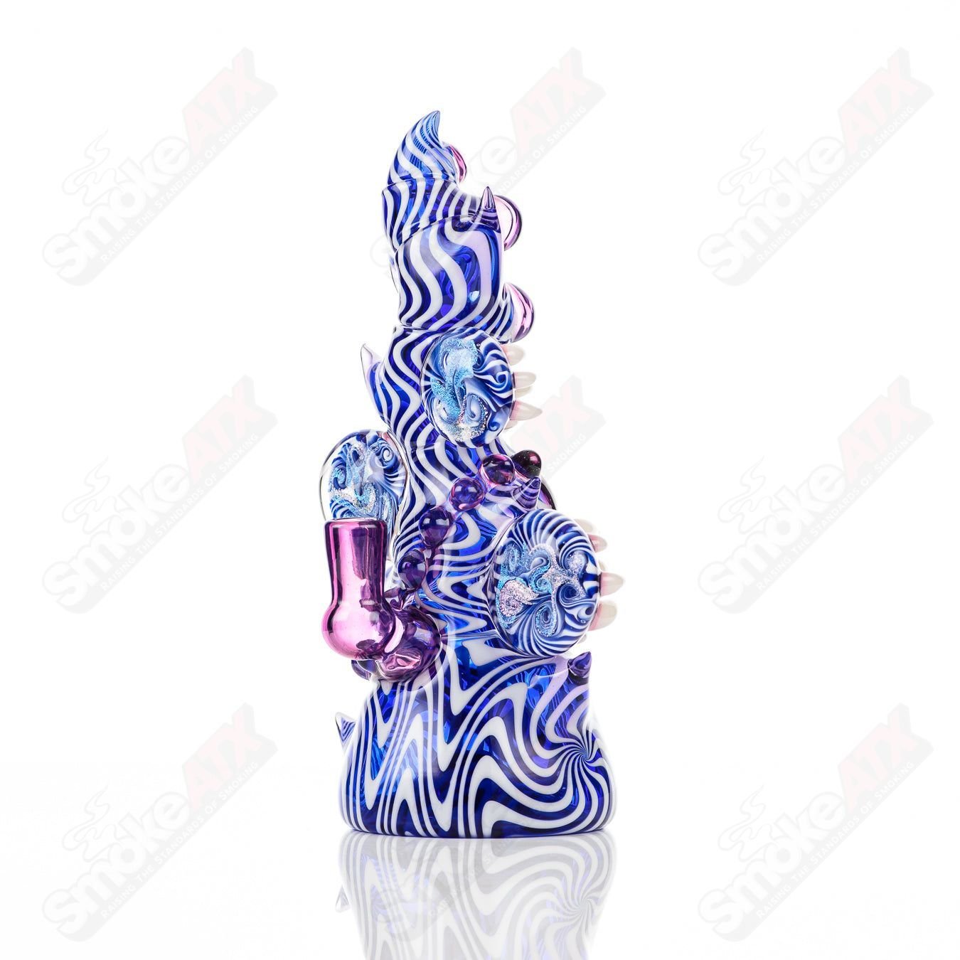 Saltacc Brackish RipCurl by Galactic Glass and Salt Glass heady concentrate rig with intricate glass design and vibrant colors.
