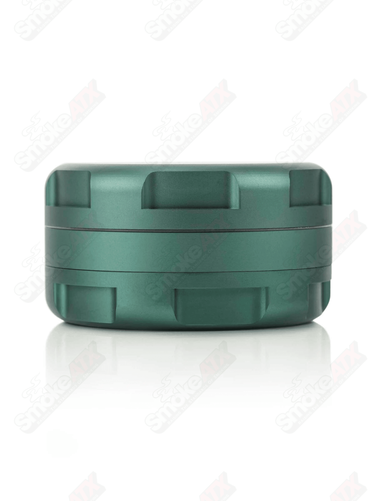 Sea green 3-piece 1.25-inch metal grinder by Grav, featuring textured grip and multiple chambers for grinding and storage.