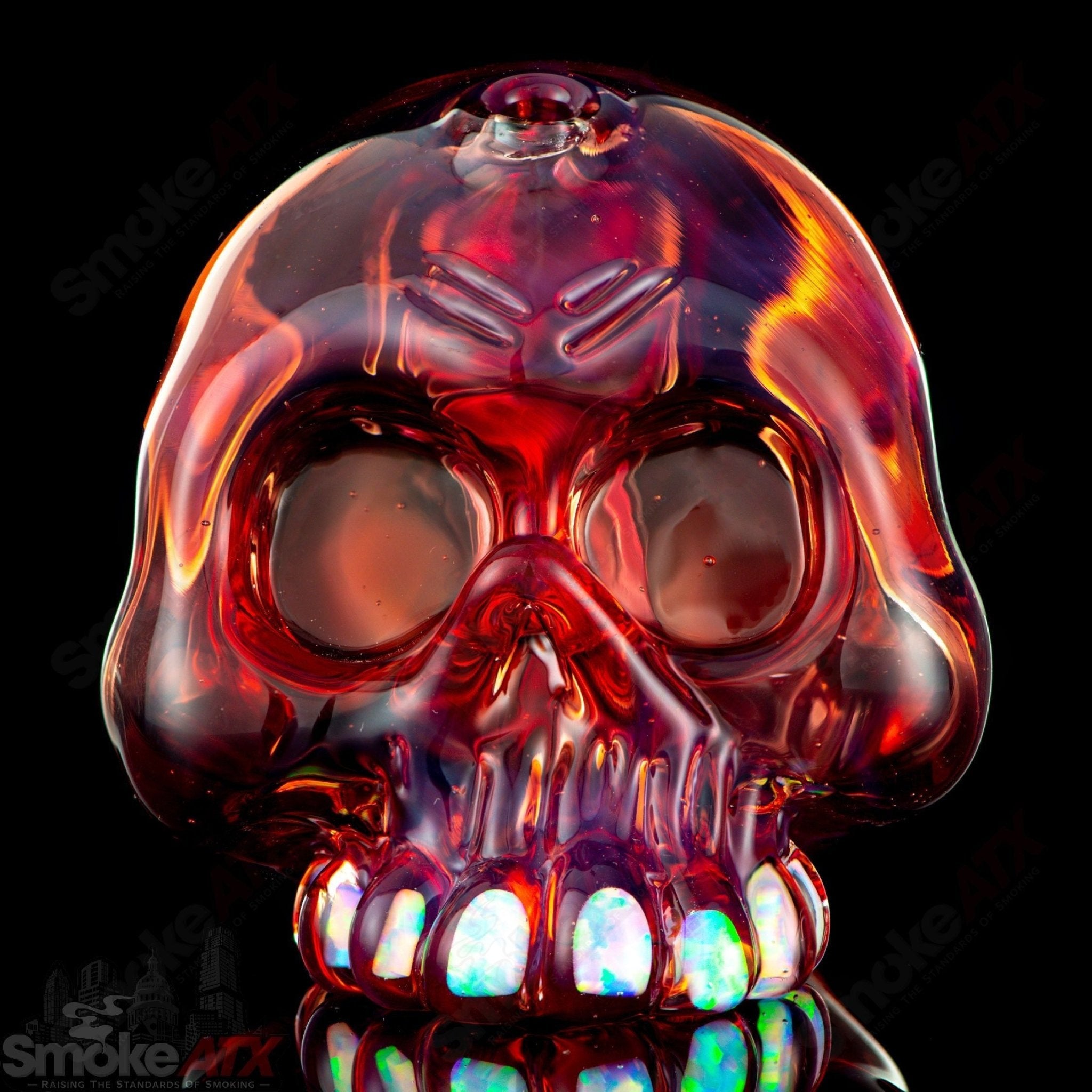 Carsten Carlile Skull Shredder heady glass concentrate rig with intricate skull design and vibrant colors.