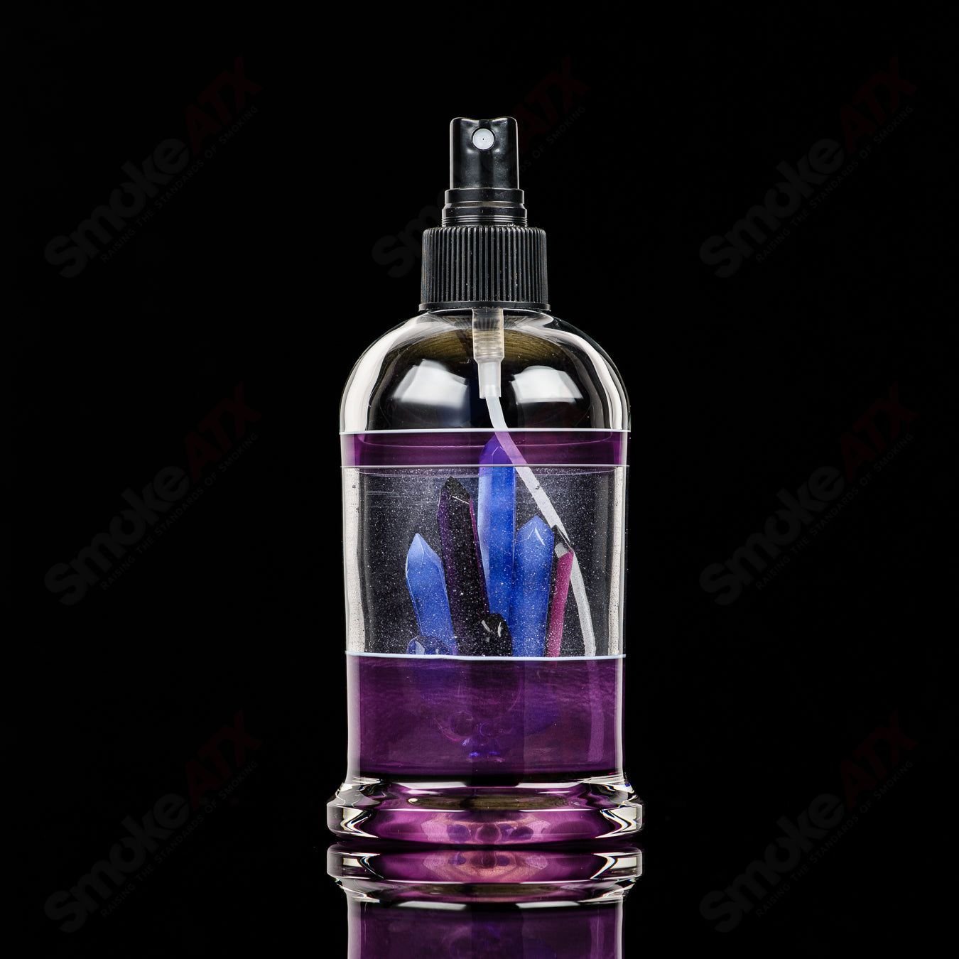 Heady Glass spray bottle from Northern Waters x SPG, featuring clear glass with a sleek design and functional spray nozzle.