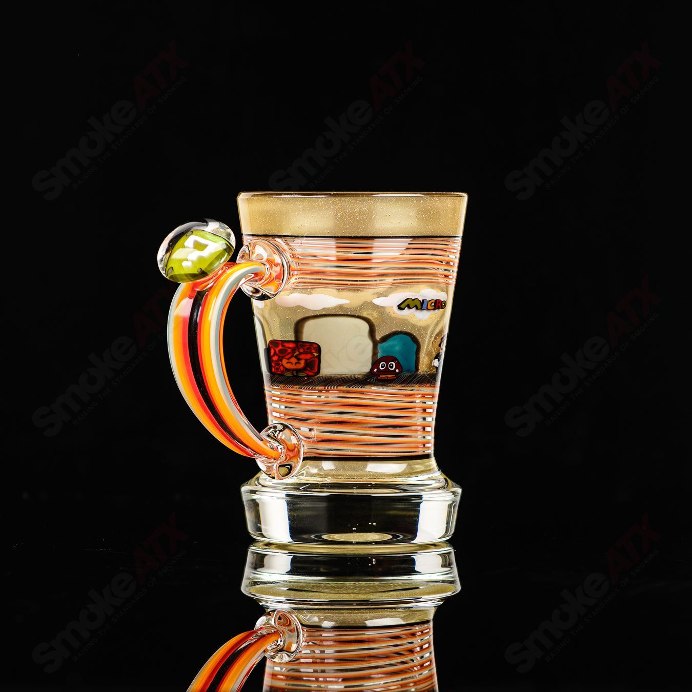 Super Mario themed Milli coffee mug by Micro & SPG, heady glass cup featuring colorful Mario design.