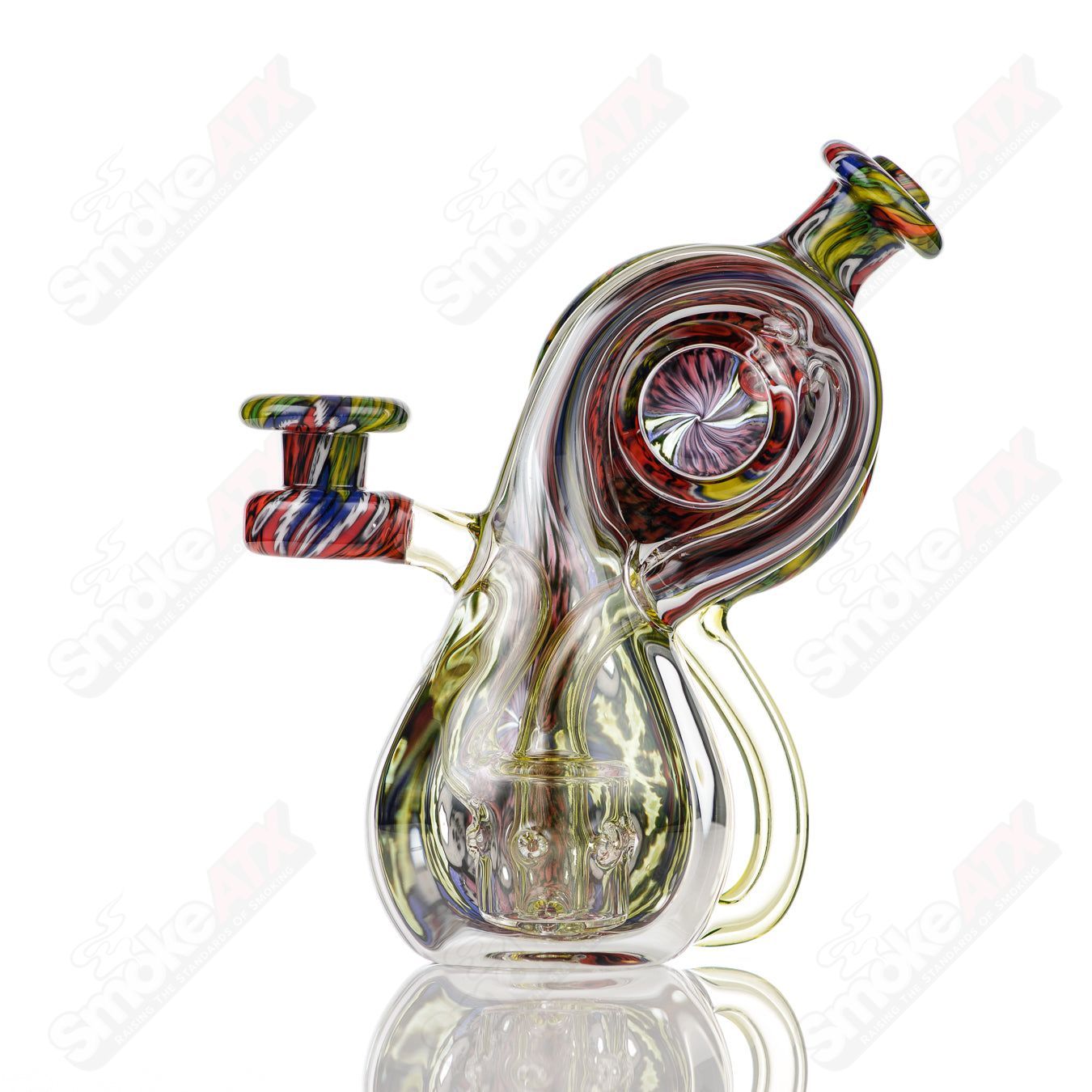 Heady glass concentrate rig featuring "The Greatful Dead" design by Earl Jr x AKM, showcasing intricate detailing.