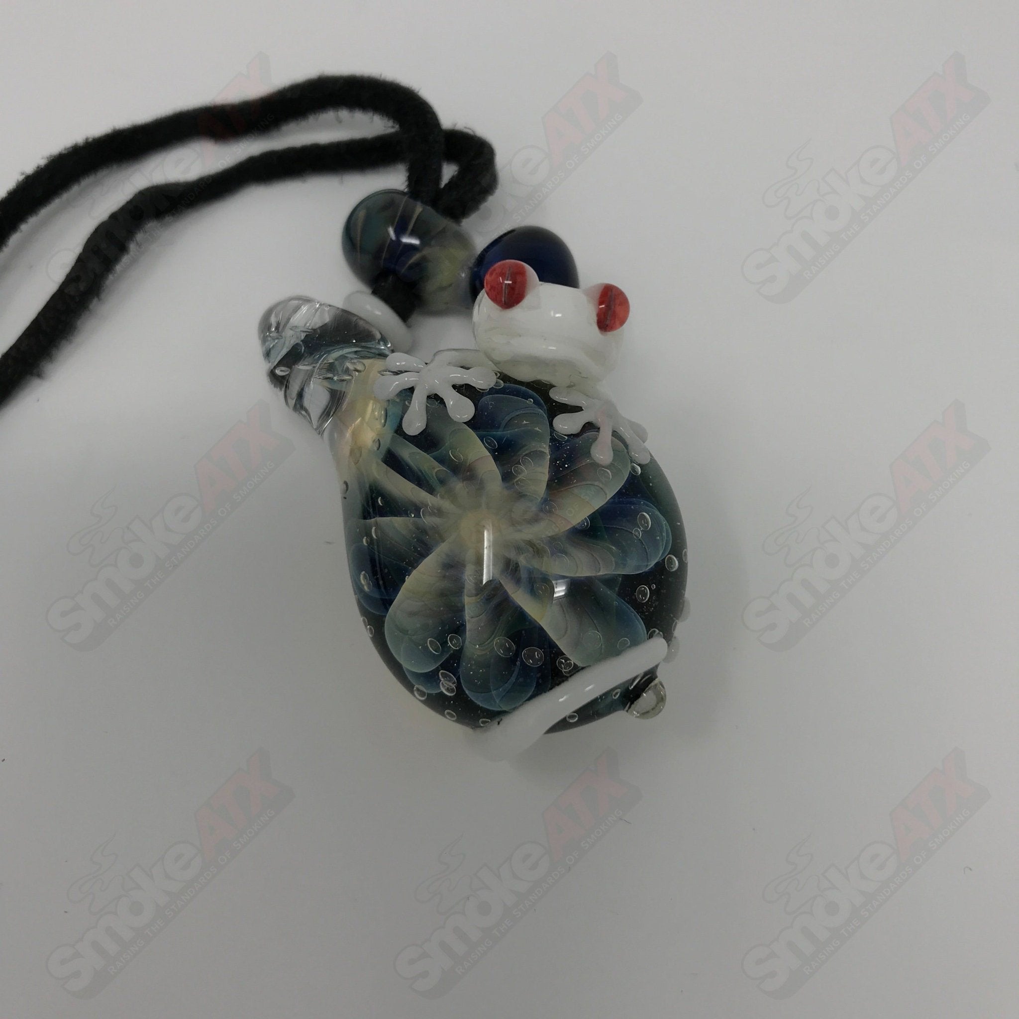 Kengtaro Tier 1 Glass Gecko Pendant, handcrafted heady glass jewelry featuring vibrant gecko design on a pendant.