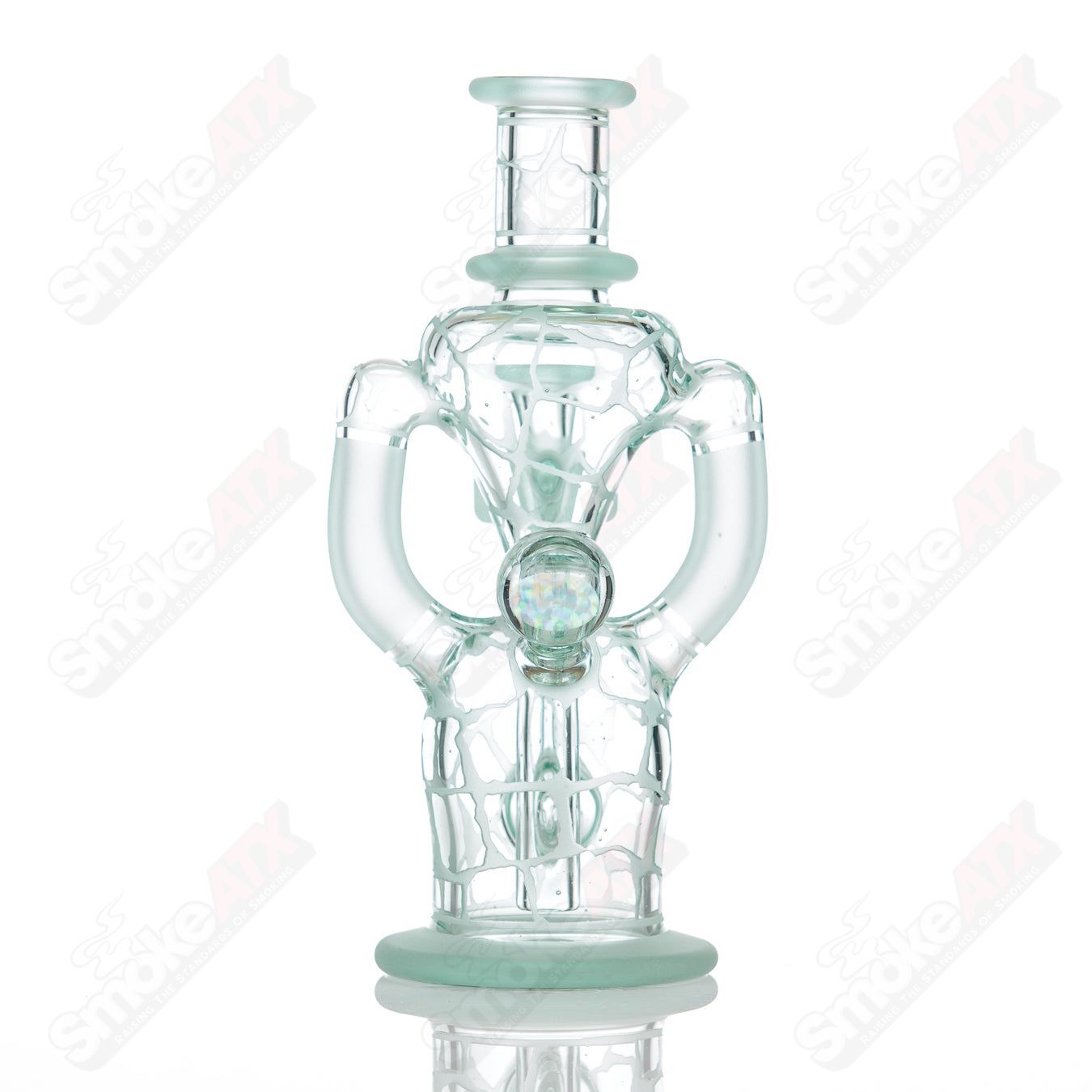 Tonic Single Color Double Up Rig by Rooster Glass, a colorful heady glass concentrate rig with intricate design details.