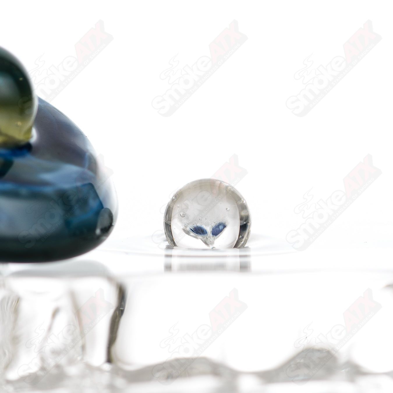 Ghost Glass UFO Slurper Set featuring colorful ghost-themed heady glass with intricate designs and multiple slurper pieces.