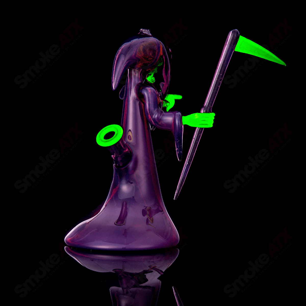 UV Reaper Joachim Glass concentrate rig by Joachim Glass, featuring vibrant UV-reactive design and intricate glasswork.